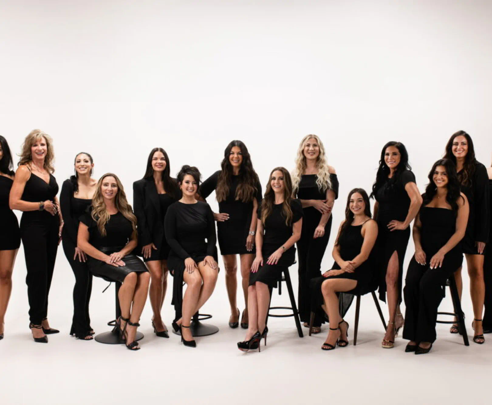 group photo of people wearing black outfits