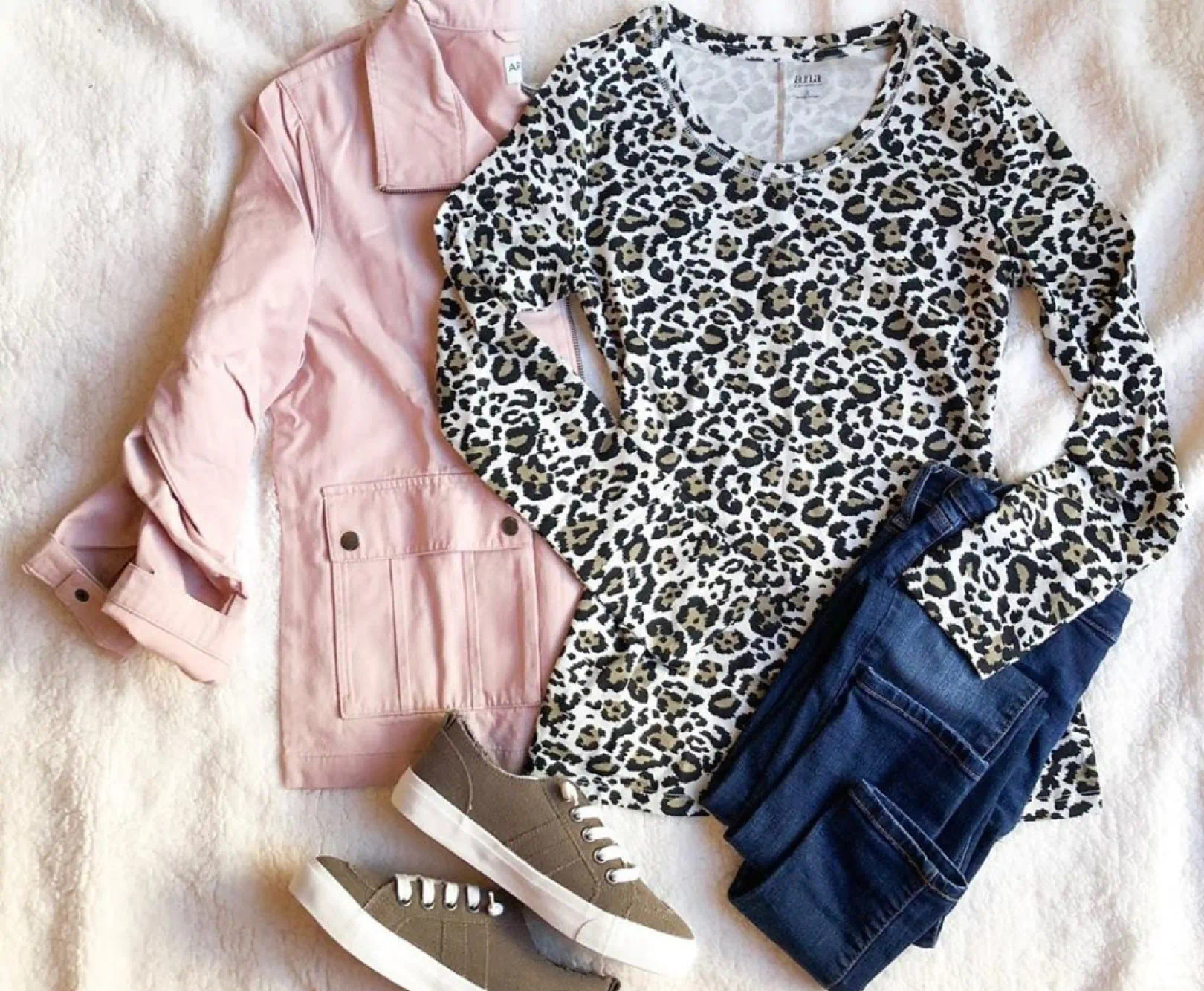 outfit laid out on bed