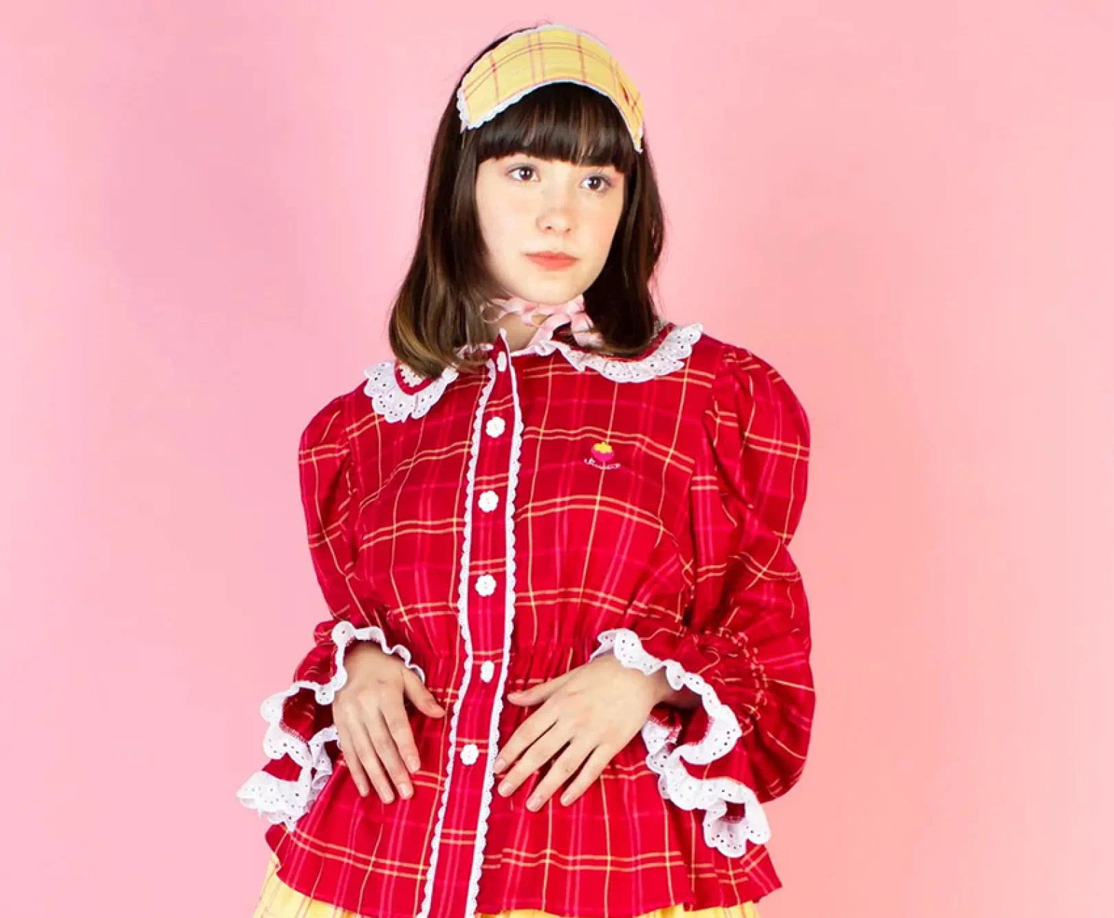 person in red button down blouse